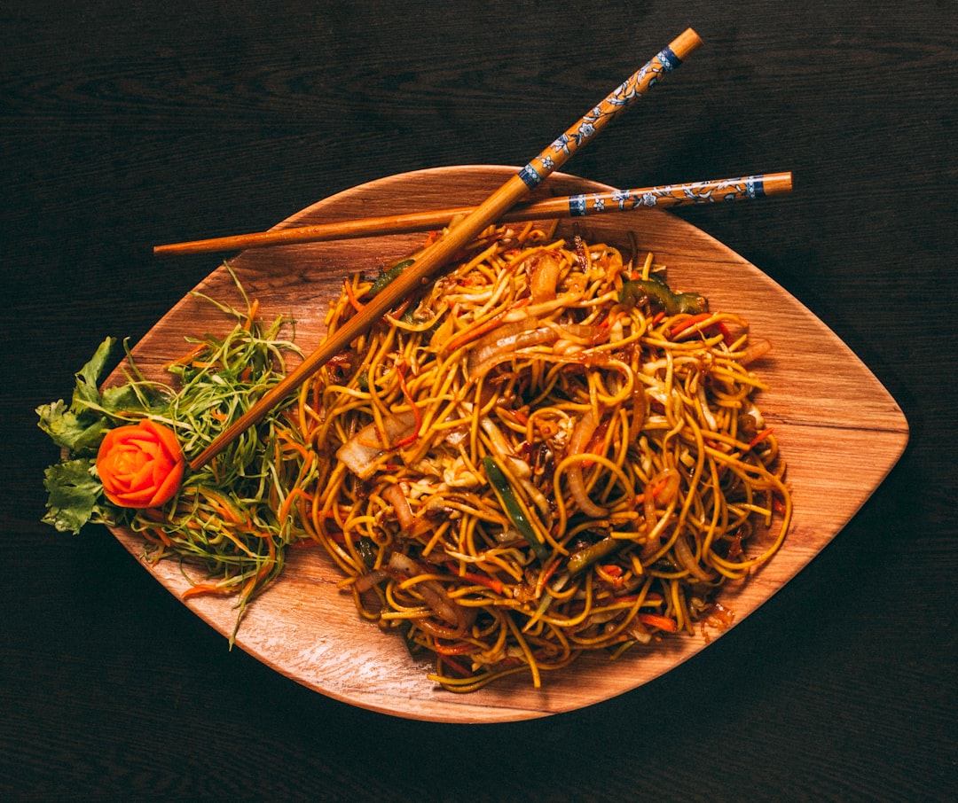 Fried Hokkien noodles in a wok