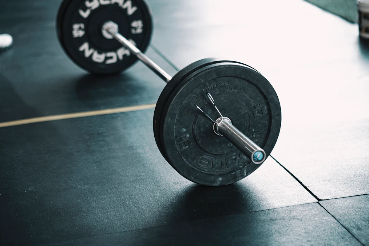 Barbell on a gym floor, representing best gyms in Singapore 2026