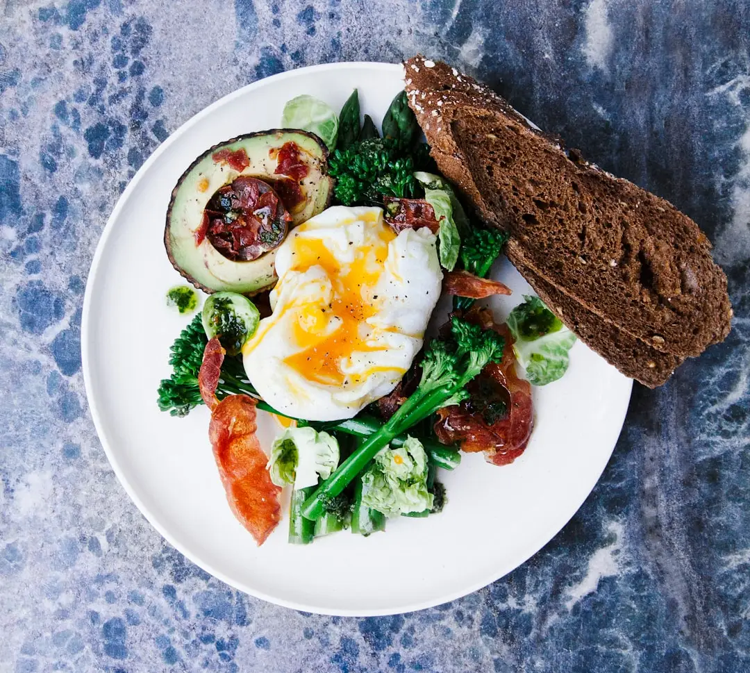 Brunch plate with avocado toast and eggs